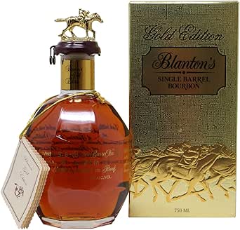 Bottle of Blanton Gold whiskey with hang tag shown next to its gold presentation box (750 ml).