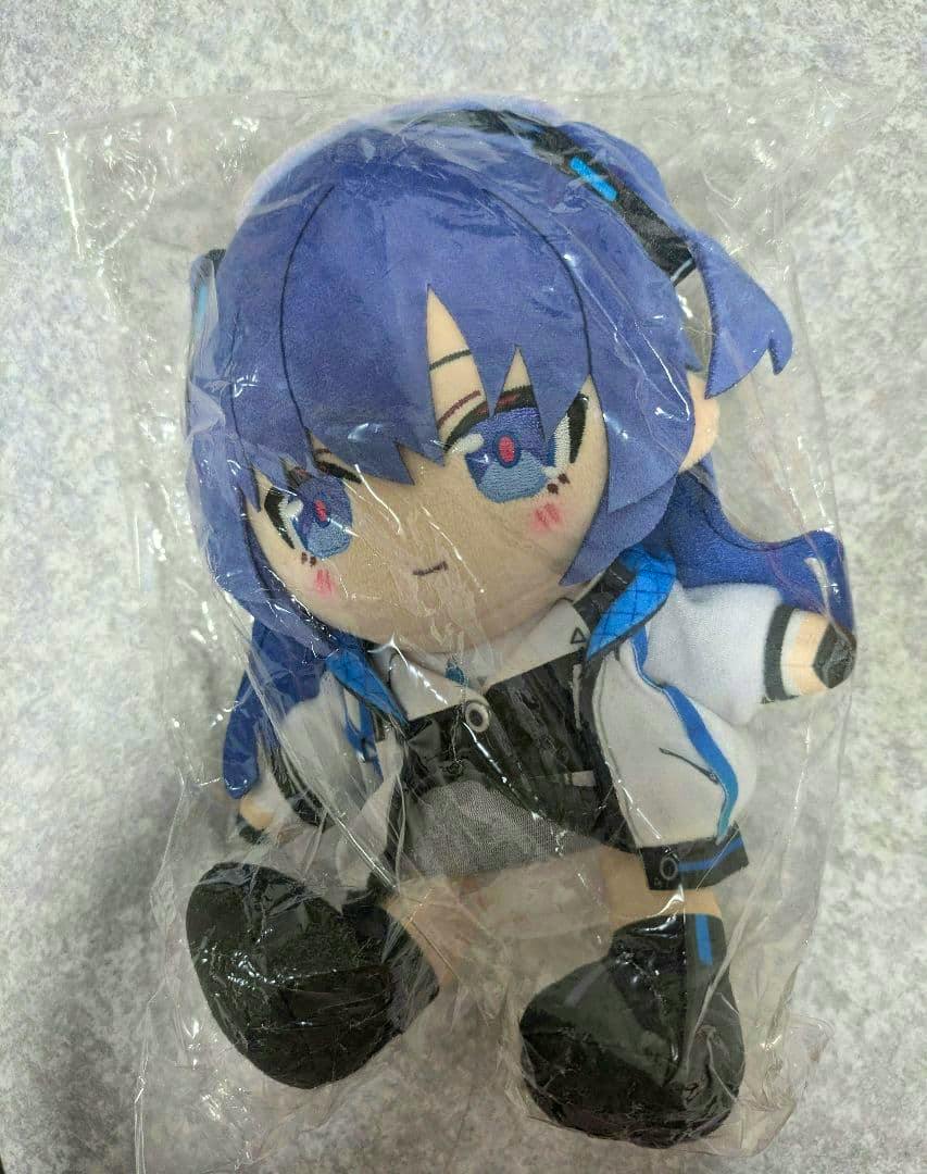 Front view of the ブルーアーカイブ ちょこぷに ぬいぐるみ ユウカ plush in clear plastic packaging showing the face and outfit.