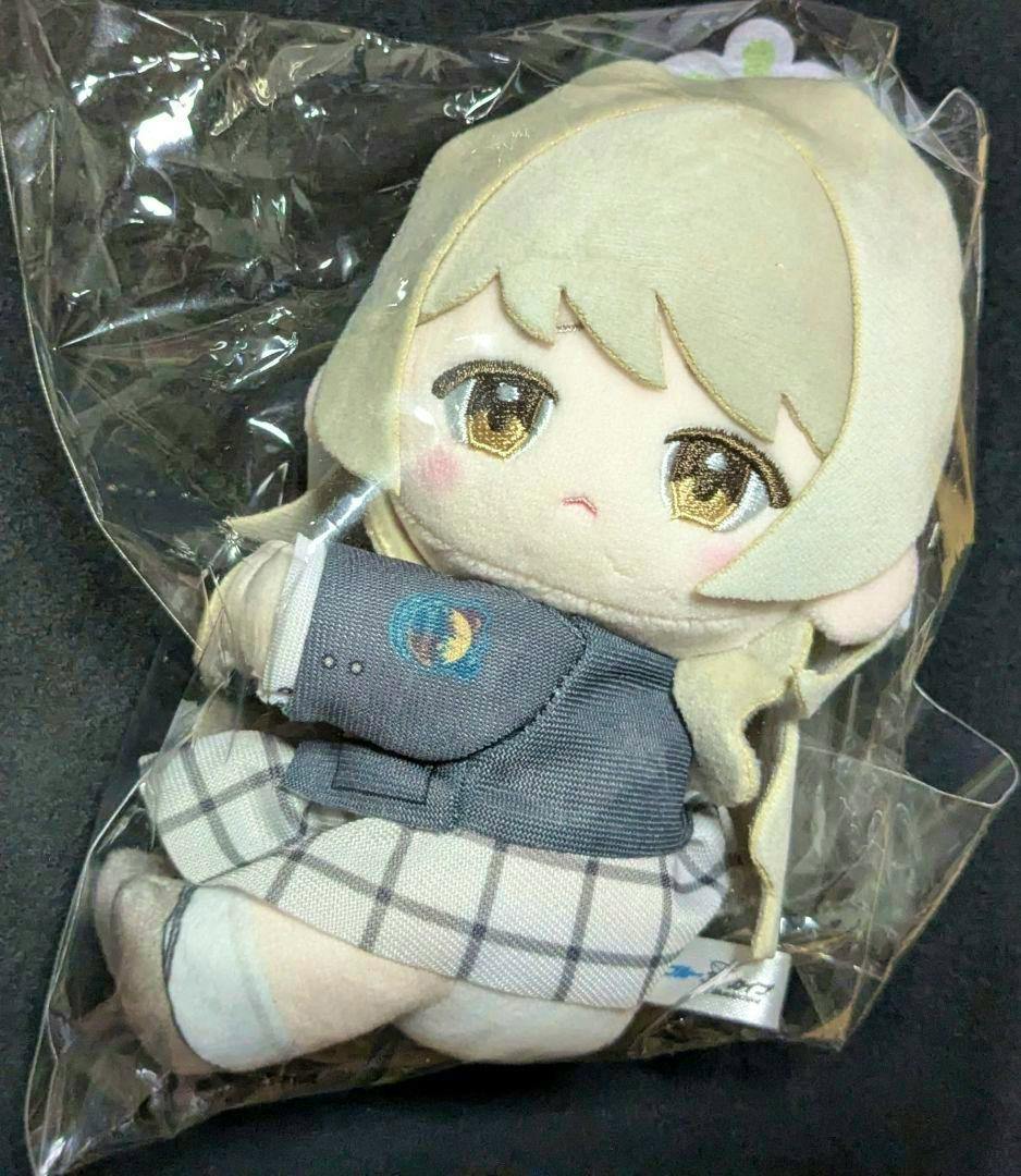 Front view of the Miyo clip plush keychain in its plastic packaging, showing the character's embroidered face and outfit.