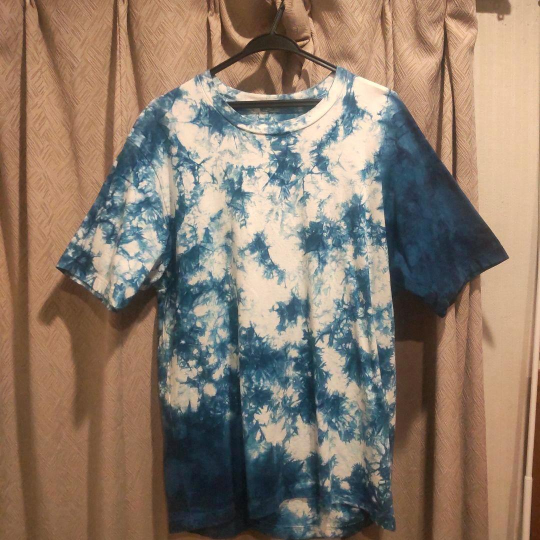 Front view of an OKURA BLUE BLUE JAPAN indigo-dyed T-shirt (size 3) hanging on a hanger showing the shirt's pattern.