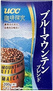 Front of a blue 200g Blue Mountain blend coffee package with an image of coffee beans and Japanese text.