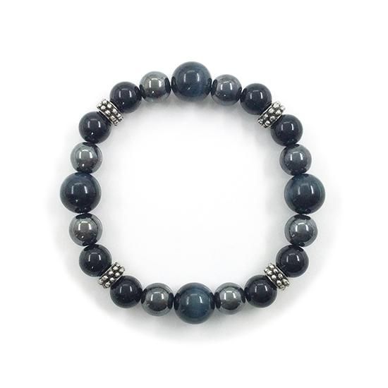 Blue tiger eye, hematite, and onyx beaded bracelet shown on a white background.