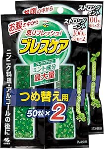 Two refill packs of Breath Care strong mint capsules in black packaging with visible green capsules.