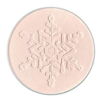Round pressed powder refill with an embossed snowflake design.