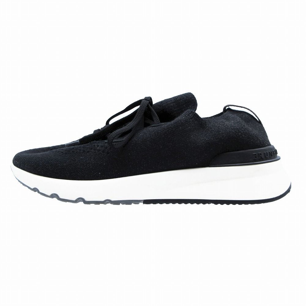 Side view of a black Brunello Cucinelli cotton knit men's running sneaker with a white sole.