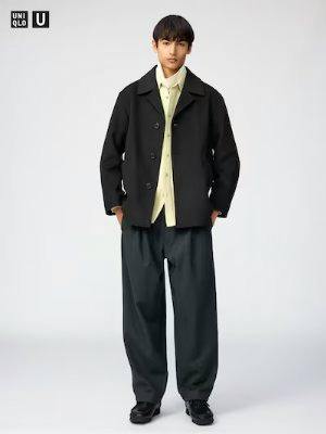 Male model wearing the men's brushed-jersey wide pants styled with a jacket and shirt.