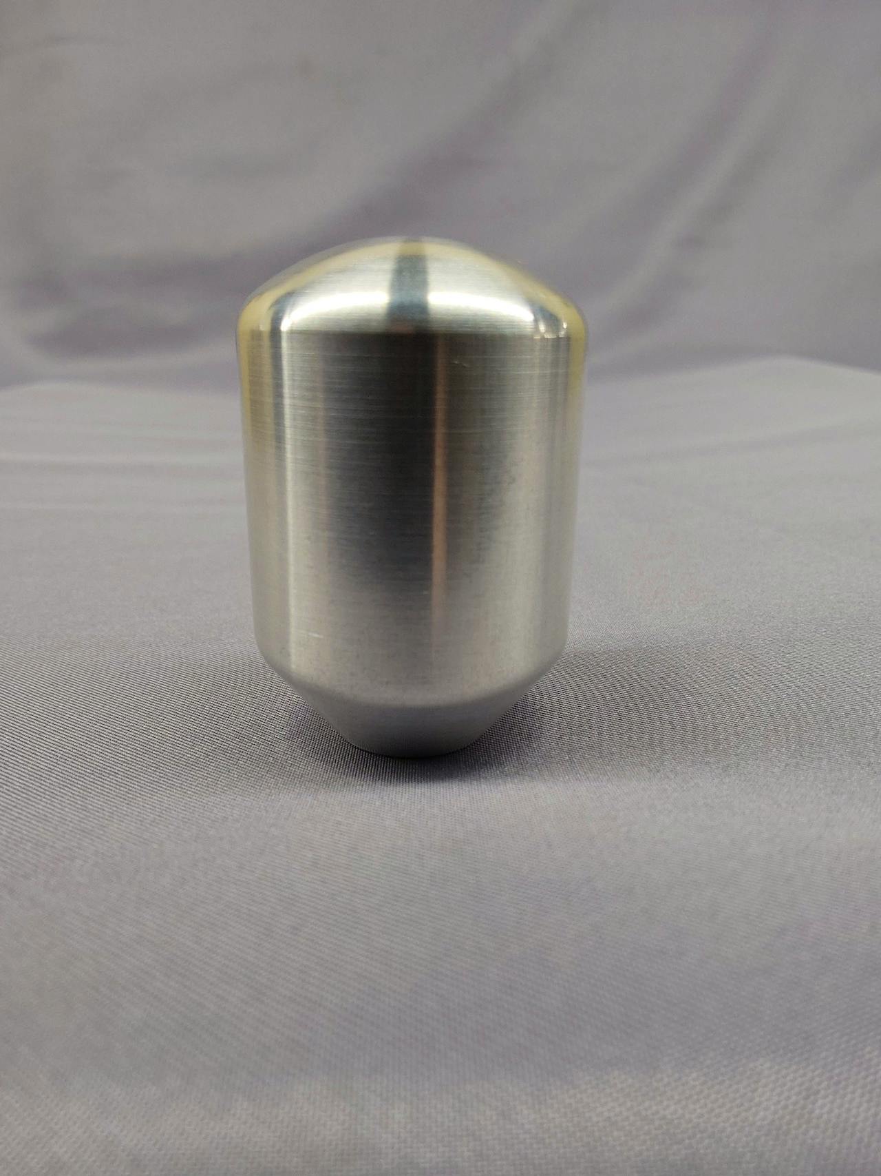 Aluminum bullet-style joystick top (Bullet Top-Al) standing upright on a gray fabric background.