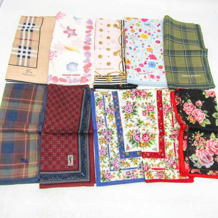 Ten assorted cotton handkerchiefs laid out flat on a white background showing different plaid, floral, and patterned designs.