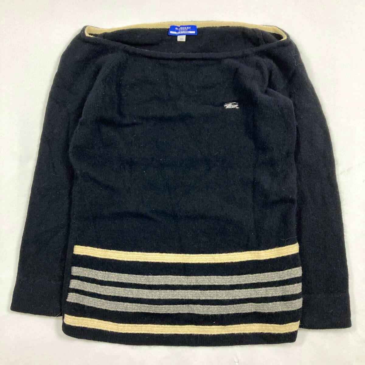 Black Burberry Blue Label women's wool sweater laid flat, showing three-quarter sleeves, a striped hem, and a small embroidered logo.