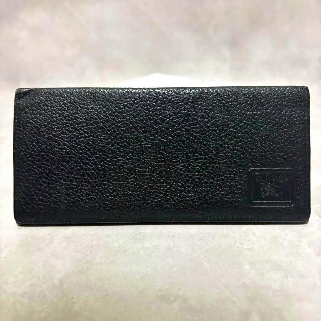 Black Burberry long wallet (cow leather) shown from the front with an embossed logo patch.