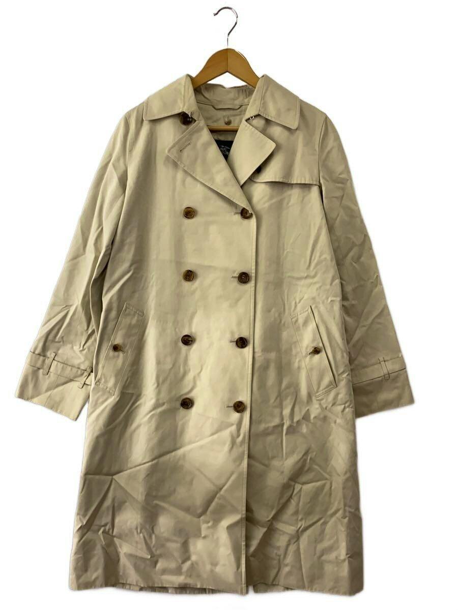 Cream Burberry London trench coat displayed on a hanger against a white background.