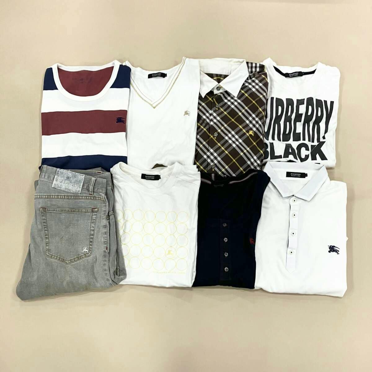 Eight folded Burberry men's shirts, T-shirts and a pair of pants arranged on a beige background.