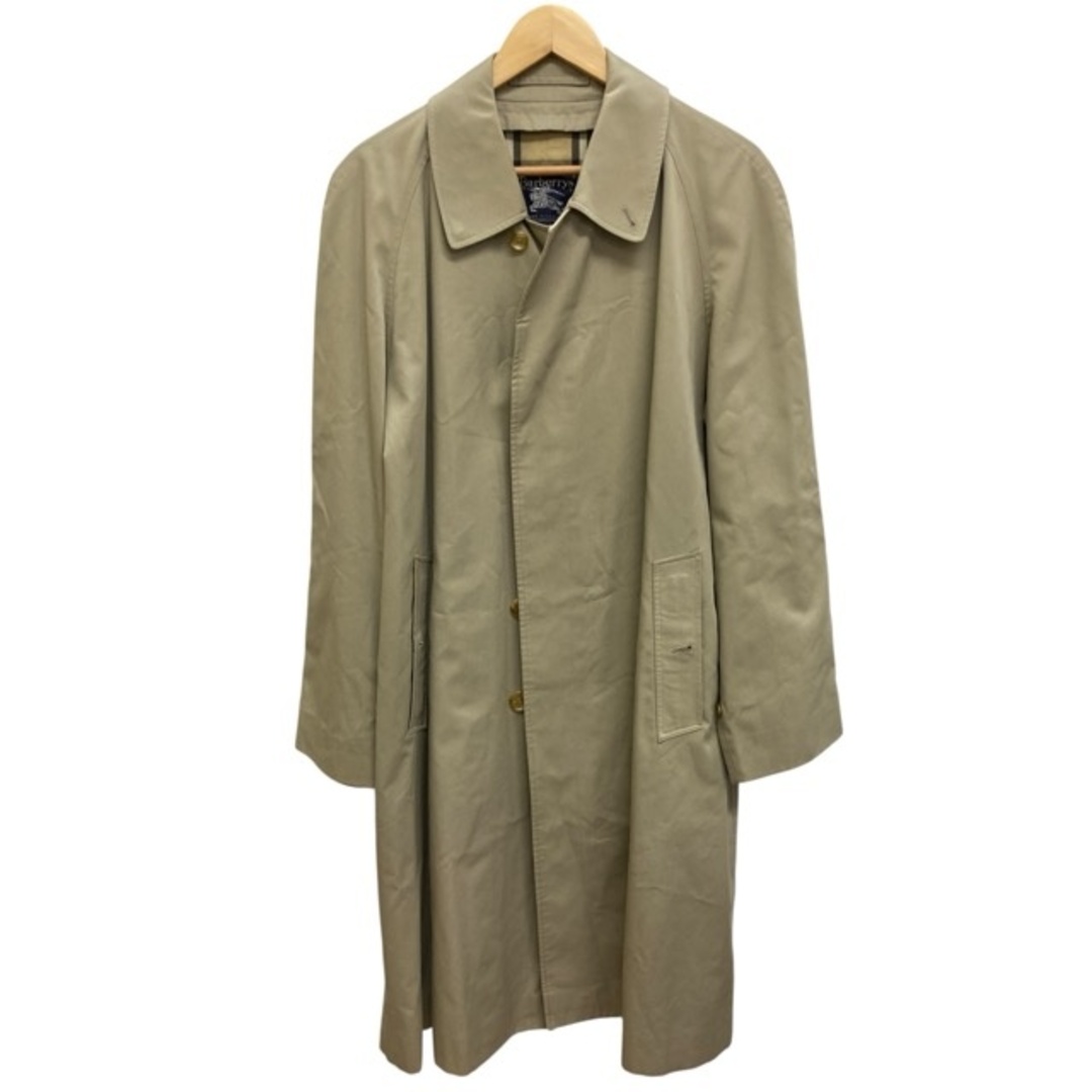 Beige Burberry light coat hanging on a hanger, full front view.