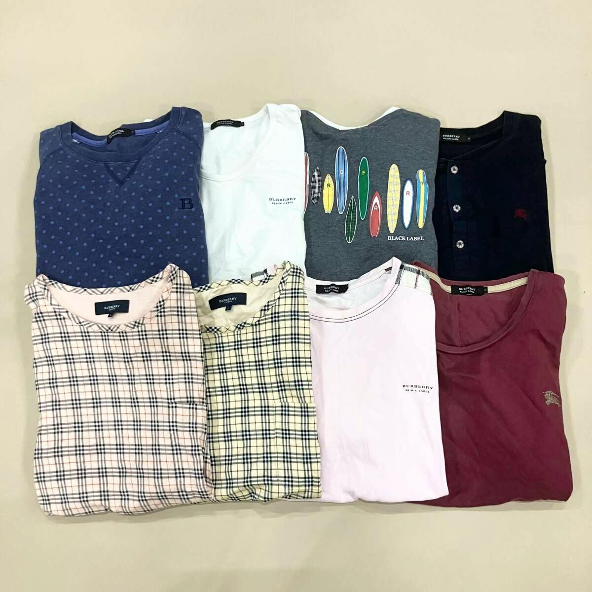 Eight folded men's Burberry shirts and tops in various colors and patterns arranged on a light background.