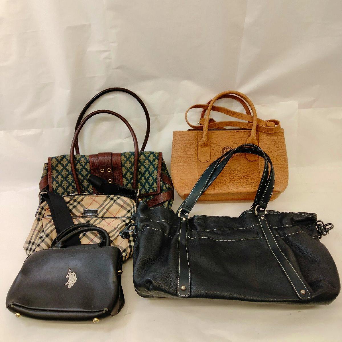 Five assorted bags (canvas and leather styles) arranged on a white backdrop, showing a black tote, tan bag, two patterned bags, and a small black shoulder bag.