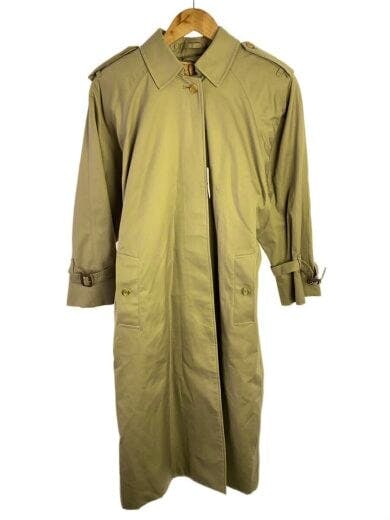 Front view of the BURBERRYS beige polyester trench coat hanging on a wooden hanger.