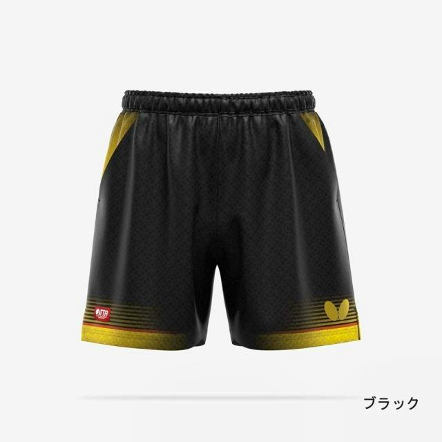 Front view of women's black polyester shorts with yellow accents, elastic waistband, and small logos.