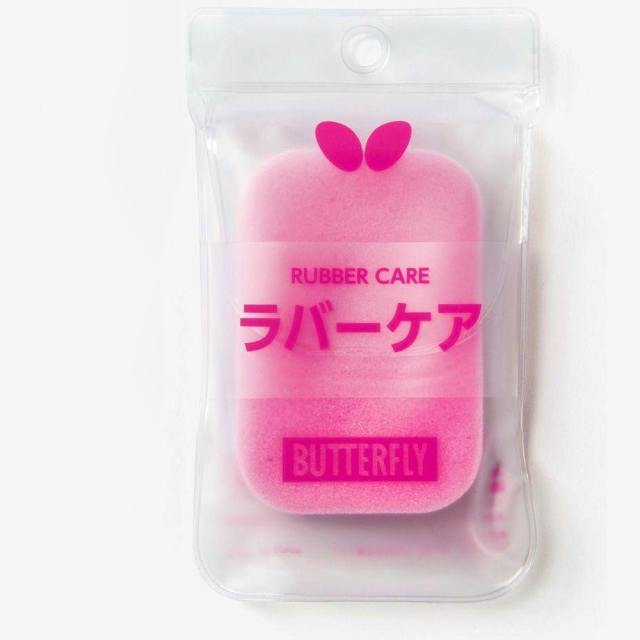 Pink rubber care sponge by Butterfly in clear resealable packaging labeled "RUBBER CARE" with Japanese text on the front.