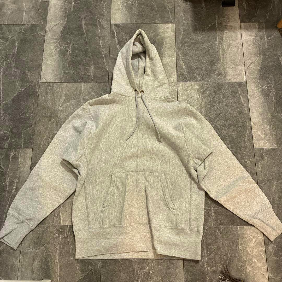Gray CAMBER hooded sweatshirt laid flat showing the front, hood with drawstrings, and kangaroo pocket.