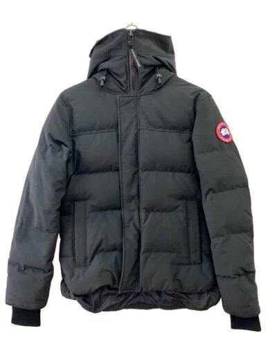 Front view of a black CANADA GOOSE men's polyester down jacket (size S) on a hanger, showing the hood, front pockets, and logo patch on the sleeve.