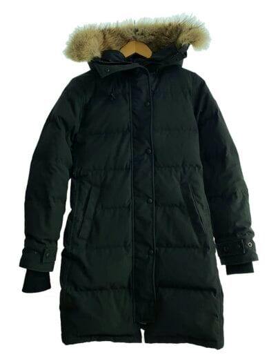Front view of a black Canada Goose Shelburne parka with a fur-trimmed hood hanging on a hanger.