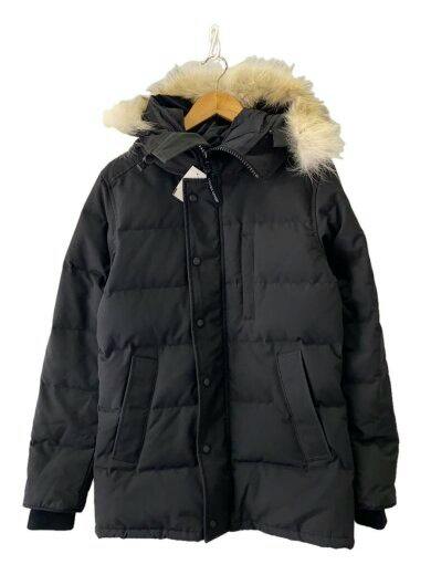 Front view of a black Canada Goose men's nylon down jacket with a fur-trimmed hood hanging on a hanger.