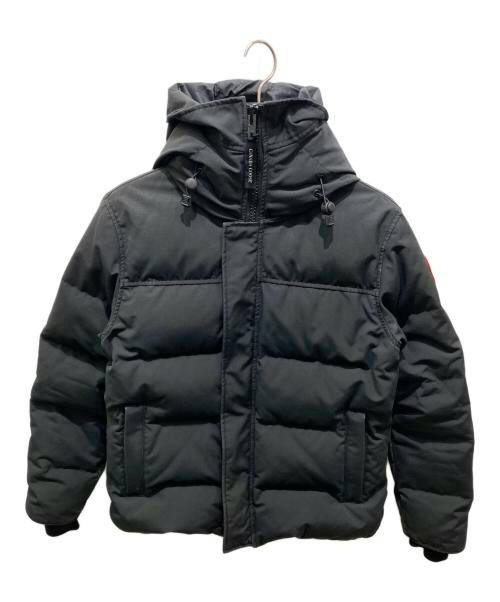 Front view of a men's MacMillan parka jacket with hood hanging on a hanger.