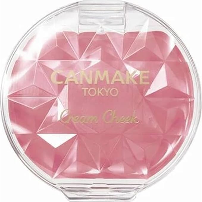 Canmake Cream Cheeks 23 Cupid Pink compact showing the pink cream blush through a clear faceted lid.