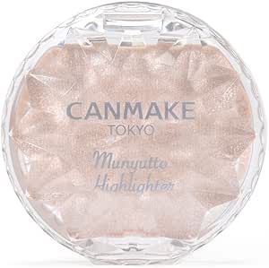 Top-down photo of the Canmake Cream Munyutto Highlighter compact (01 Moonlight Gem) showing the pale beige highlighter in a clear faceted plastic case.