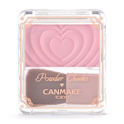 A clear plastic compact showing a pink powder blush (P02 Little Shy Pink) with a heart-embossed surface and a small brush.
