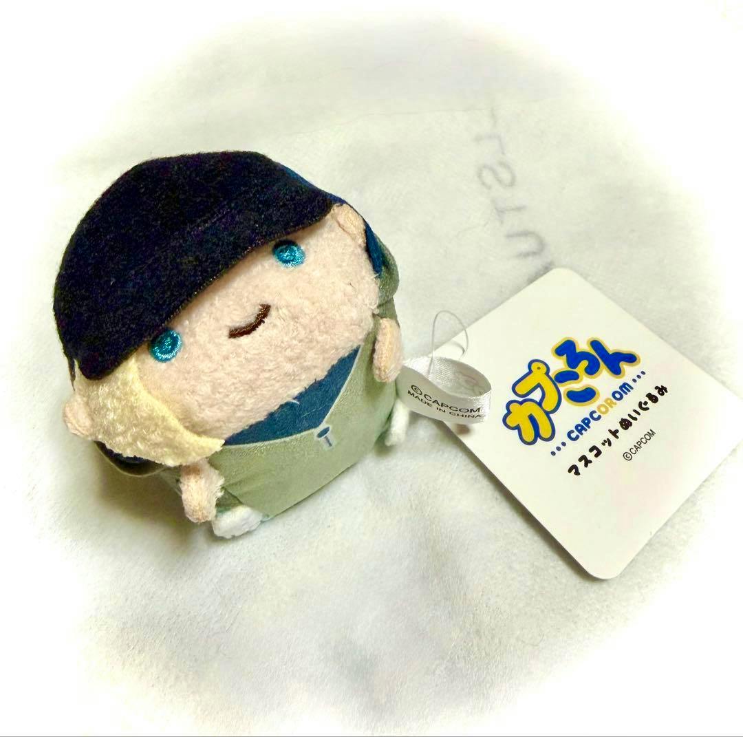 Round plush of Rosemary Winters from Biohazard (Resident Evil) with an attached Capcom tag on a white background.