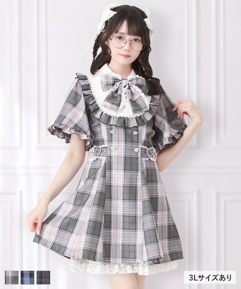 Front view of a model wearing the women's cape-style flare-sleeve yoke dress (polyester) in plaid.