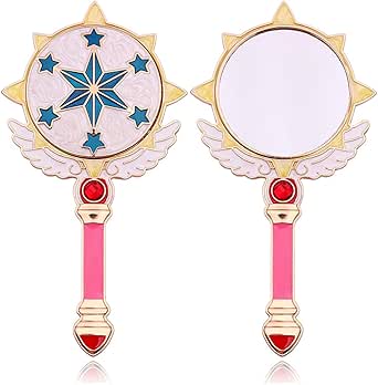 Front and back views of the Card Captor Sakura handheld round makeup mirror with a pink handle and gold star and wing decorations.
