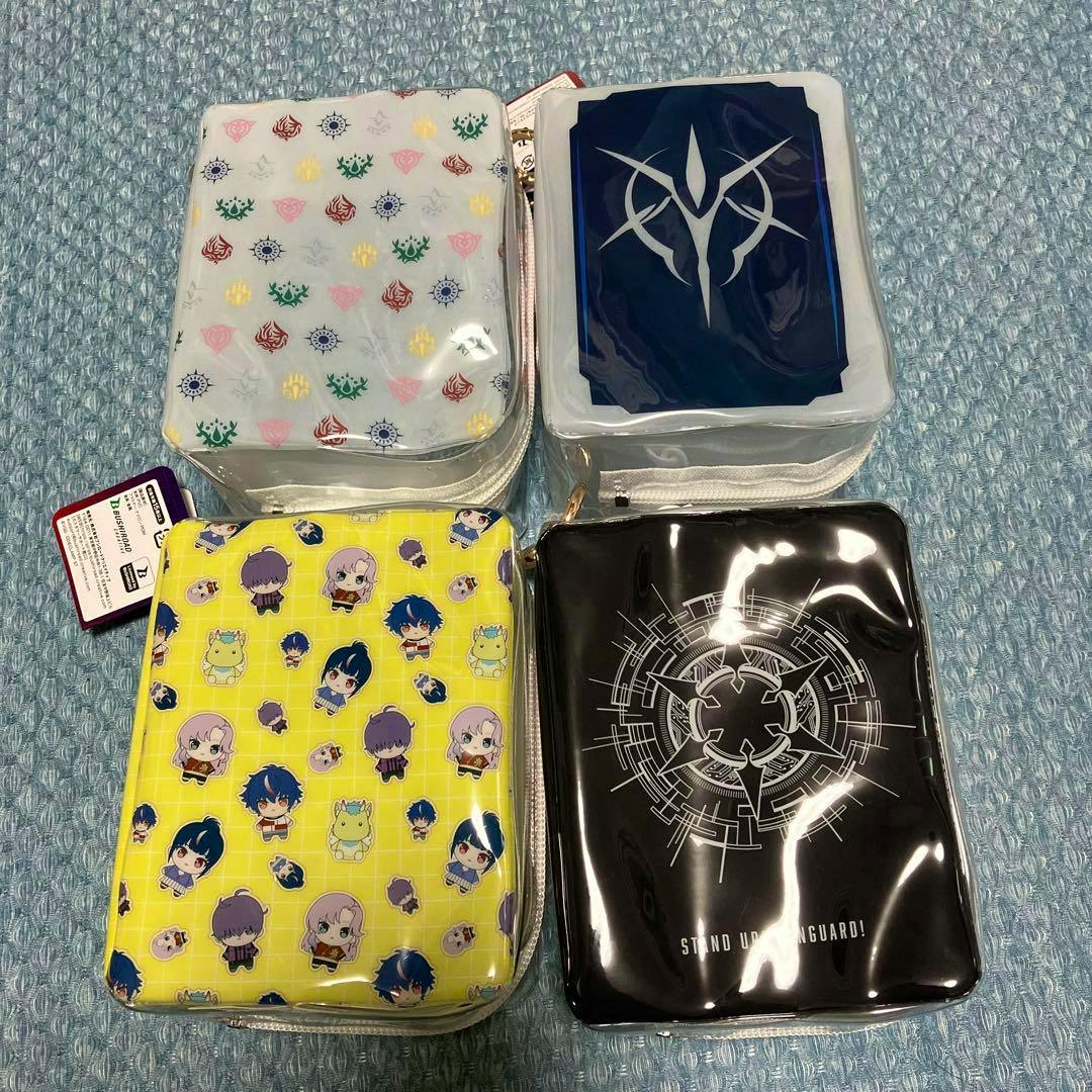 Four Vanguard multi-pouches with different printed designs arranged on a textured surface.