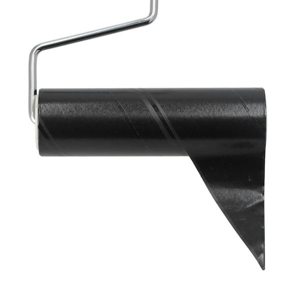 A black spare adhesive tape roll mounted on a small metal roller showing an angled cut end.