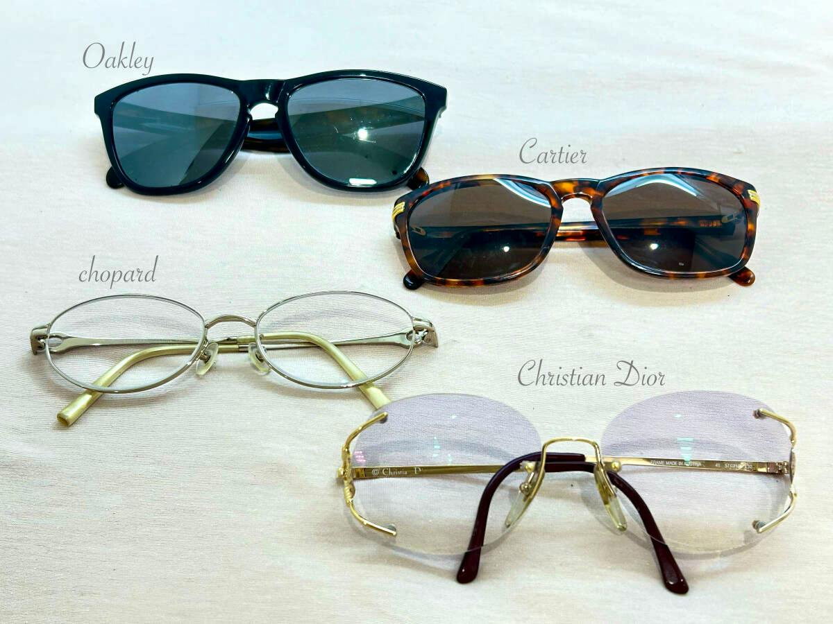 Four sunglasses labeled Cartier, Christian Dior, Chopard, and Oakley displayed on a light background.