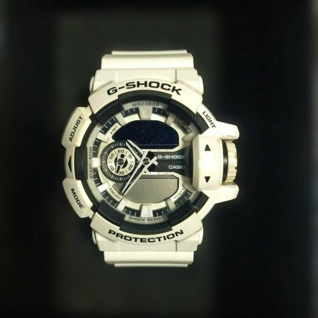 Front view of a white CASIO G-SHOCK GA-400 wristwatch against a dark background.