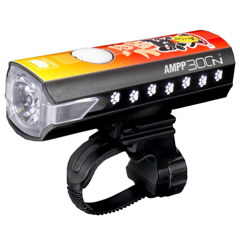 Angled photo of the AMPP300N bicycle light showing paw-print accents and its handlebar mount.