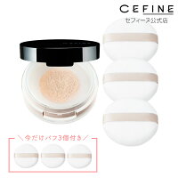 Open face powder compact with visible powder and three round powder puffs shown beside it.