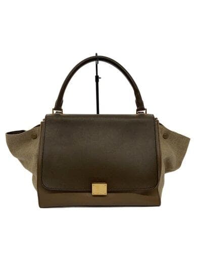 Beige CELINE canvas shoulder bag with top handle and front flap shown front-facing.