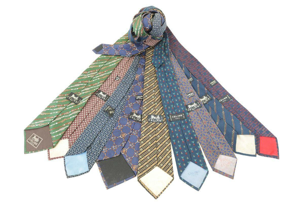 Nine patterned CELINE men's silk neckties fanned out on a white background.