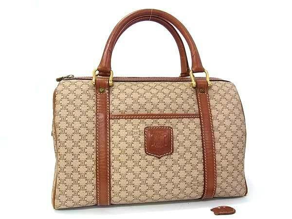 Front view of a brown CELINE vintage Macadam-pattern PVC and leather mini boston handbag on a white background.