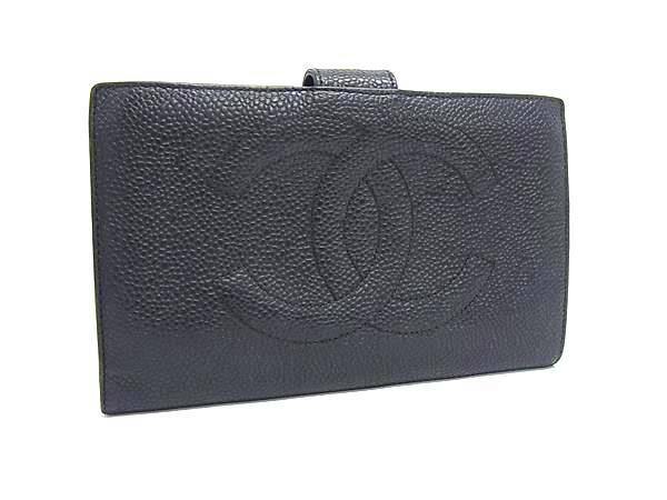 Black CHANEL caviar leather two-fold long wallet showing the front with embossed CC logo and snap tab closure.