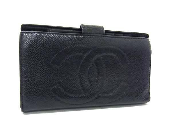Black CHANEL caviar leather bi-fold long wallet with embossed interlocking CC logo shown closed on a white background.