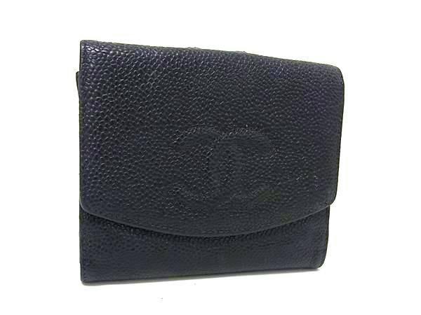 Black CHANEL caviar skin two-fold wallet with an embossed interlocking CC logo on the front.
