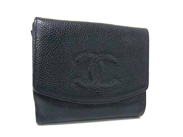 Front view of a black CHANEL caviar-skin cow leather bi-fold wallet with an embossed interlocking CC logo on the flap.