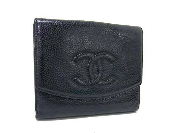 Black CHANEL caviar cow leather two-fold wallet with an embossed interlocking CC logo on the front.