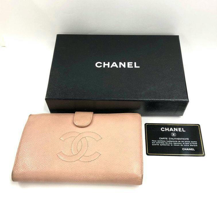 Pink CHANEL caviar-skin long wallet with CC logo shown with its box and authenticity card.