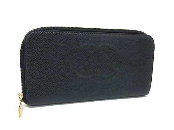 Black CHANEL caviar leather zip-around long wallet with an embossed CC logo on the front.