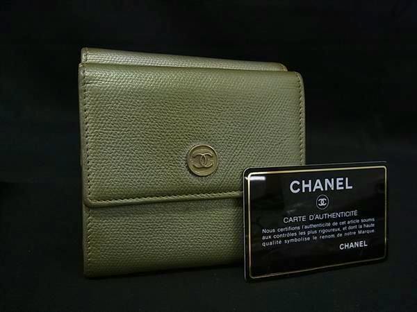 Light green CHANEL tri-fold leather wallet with a Coco button emblem shown alongside an authenticity card.